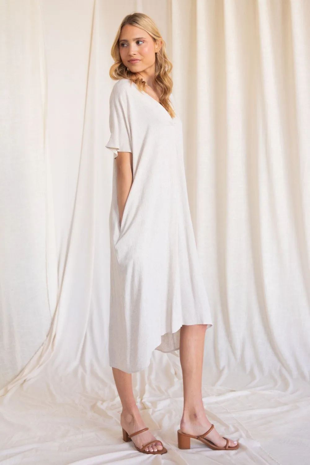 Linen maxi dress with a v neckline and side pockets (multiple colors available)